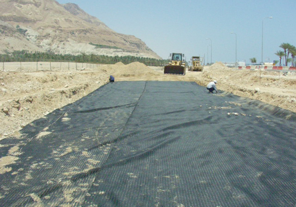 Bridging over sinkholes by Geogrids and Geotextiles - Ein Bokek