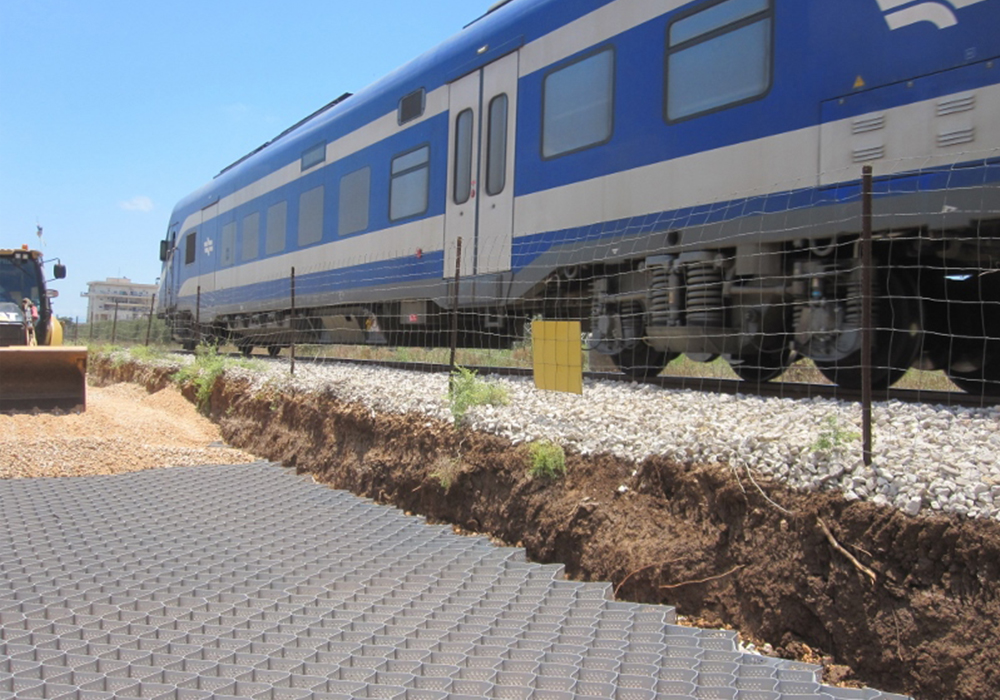 Load support of roads and railways bases by Tough cells Neoloy and biaxial geogrids - Akko- Nahariya railway